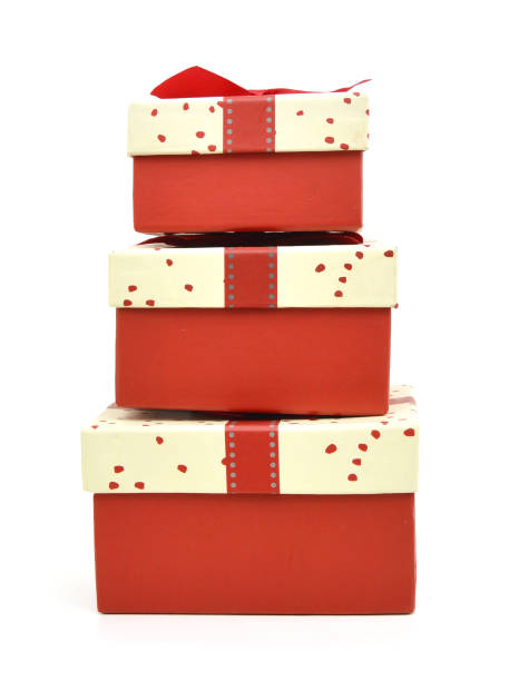 istock Red gift box with ribbon bow isolated on white background 958478578