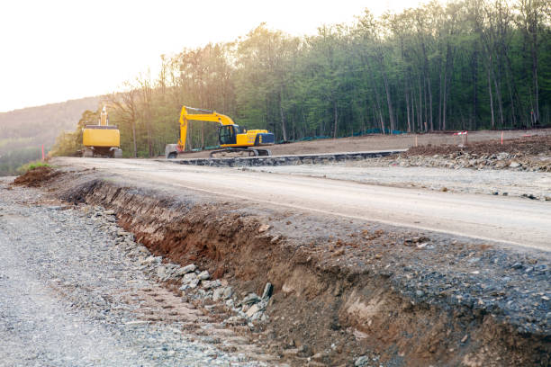 istock excavator at street construction site on the countryside 958478938