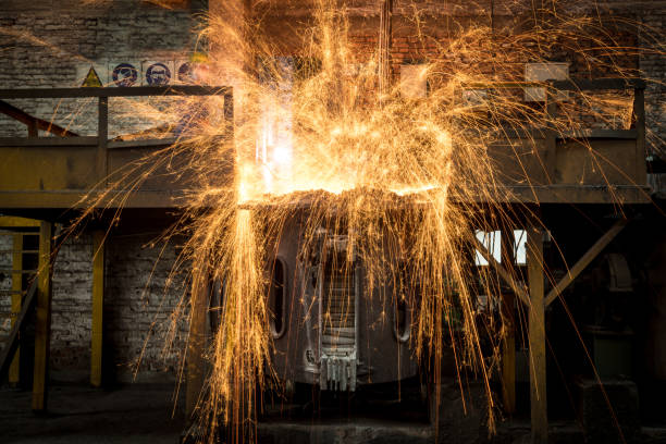 Steel Workers Pouring Molten Steel