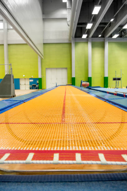 istock Empty Gymnastics Gym with Vaulting Trampoline 958491880