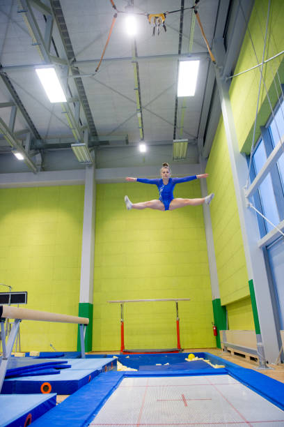 istock Late Teen Athlete Enjoying Trampoline Training 958492518