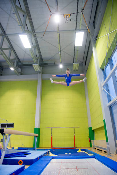 istock Late Teen Athlete Enjoying Trampoline Training 958492522