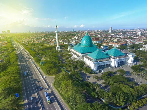 Al Akbar Mosque Surabaya, is a Located in SURABAYA INDONESIA with blue sky background