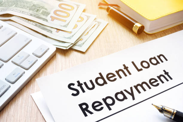 istock Student Loan Repayment form on a desk. 958495966