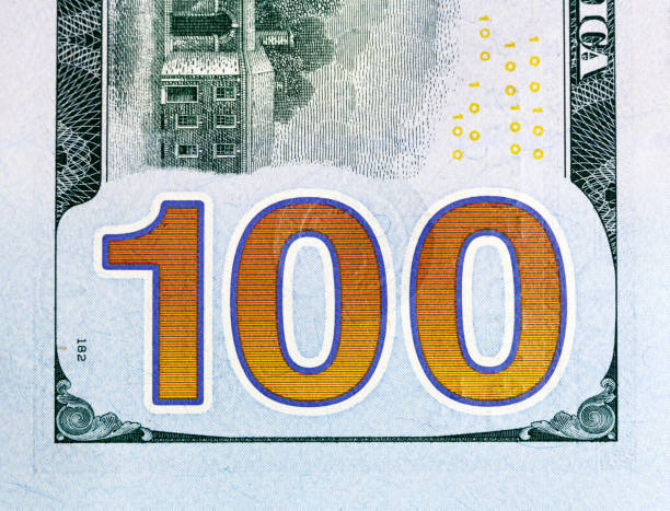 istock Number 100. Hundred dollars bill fragment closw-up, new edition 958495976