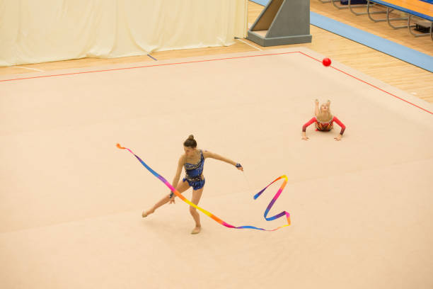 istock Teenage Rhythmic Gymnastics Athletes Training 958496598