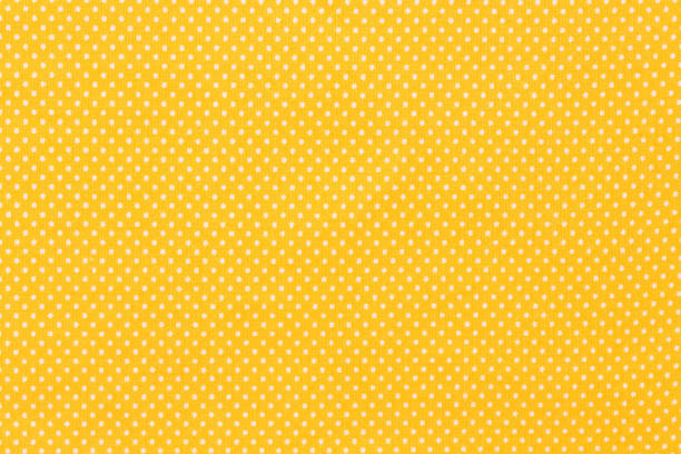 istock Yellow or gold light smooth and shiny fabric 958497014