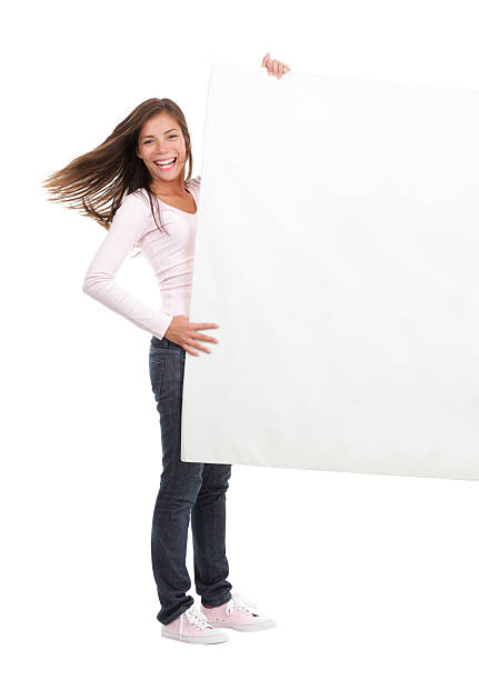 istock Woman holding blank billboard sign 95849895