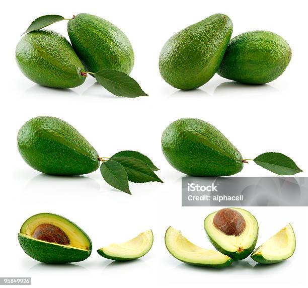 Set Of Ripe Sliced Avocado Fruits Isolated On White Stock Photo - Download Image Now