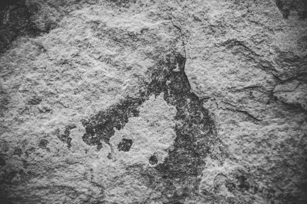 istock Close up of natural stone wall. Stone wall texture 958503916