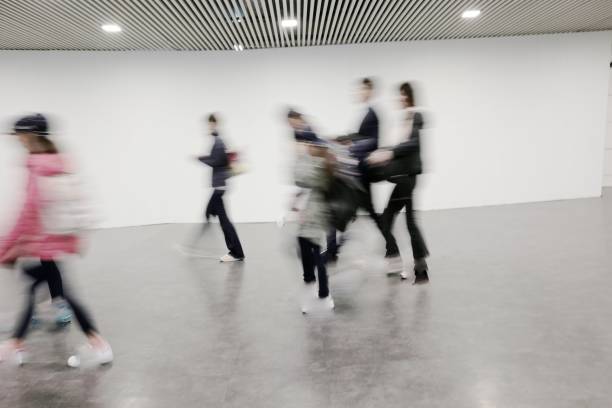istock blurred people at the airport 958511664