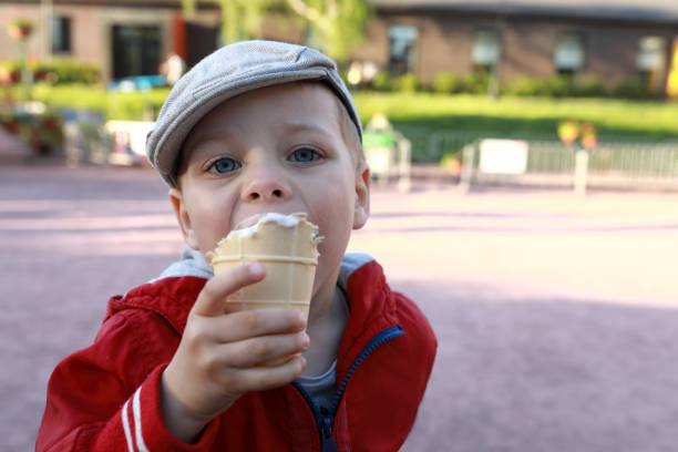 istock Child eating ice cream 958518688