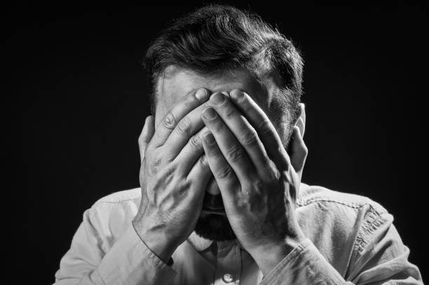 istock The man buries his head in his hands. 958521956