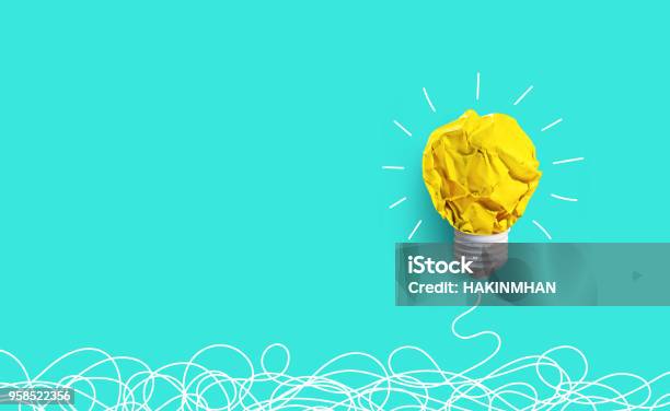 Creativity Inspiration Ideas Concepts With Lightbulb From Paper Crumpled Ball Stock Photo - Download Image Now