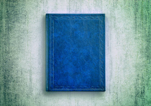mock up book blue color on grunge background close-up, top view