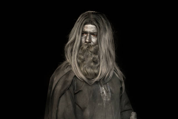 istock long haired man made of gray make up; mythological bearded man 958525834