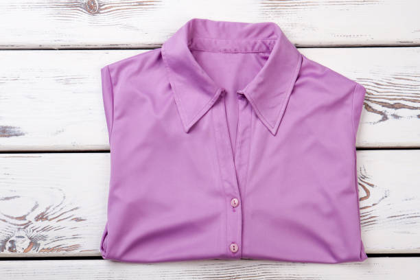 istock Female purple color buttoned shirt. 958526942