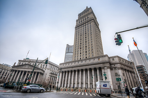 New York, US - March 29, 2018: The united states court house in central Manhattan on a foggy day