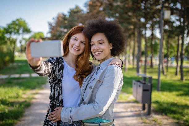 istock Reunited friends doing a selfie 958530080
