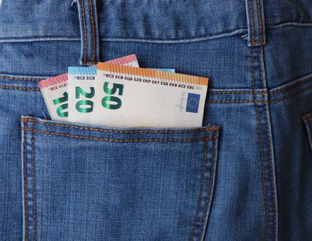 istock Euro banknotes in jeans pocket closeup 958530390
