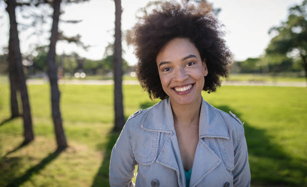 istock Lovely girl in denim jacket smiling 958535194
