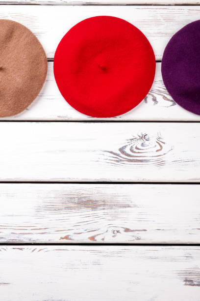 istock Set of female berets, copy space. 958536030