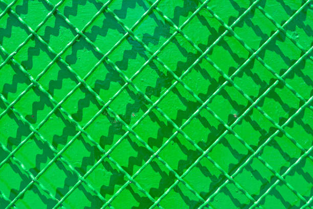 Green metal reconditioned fence. Background for your illustration