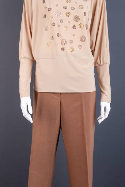 istock Female mannequin dressed in classic apparel. 958543496