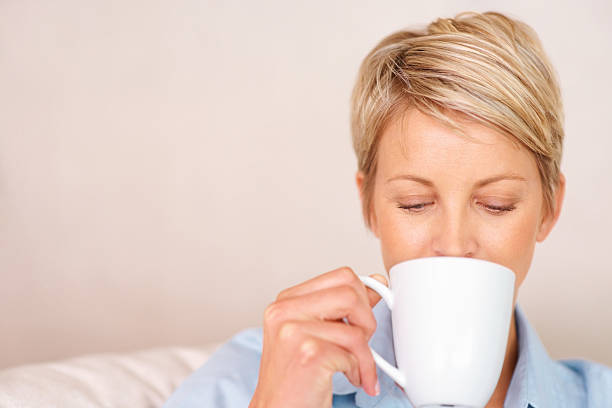 istock Beautiful woman having a cup of coffee 95854578