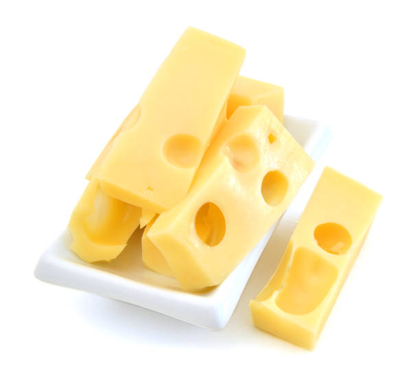 istock piece of cheese isolated in white plate on a white background 958546716