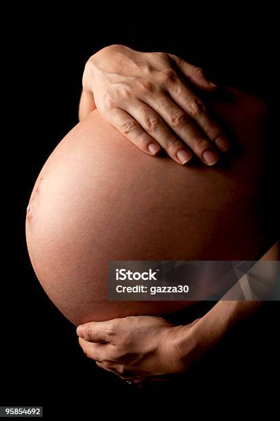 Pregnant Womans Stomach Stock Photo - Download Image Now - Naked, Pregnant, One Woman Only