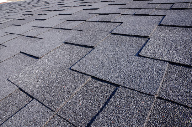istock Close up view on asphalt roofing shingles 958547218