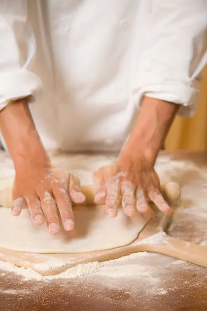Photo of Kneading pizza dough