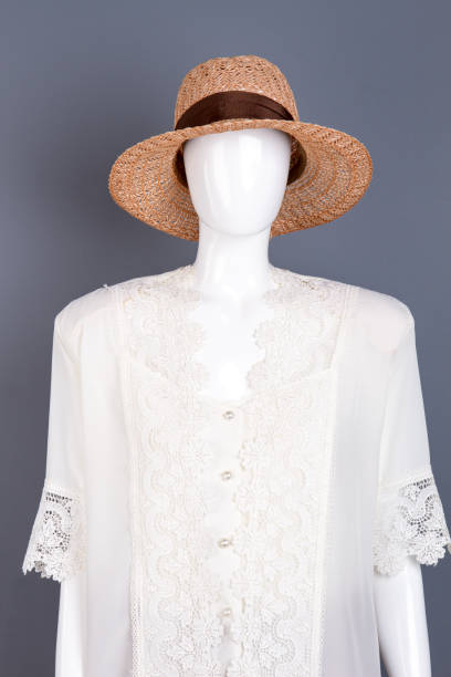istock Elegant straw hat on female mannequin. 958550960
