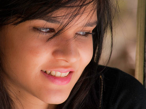 istock Beautiful young woman thinking 95855108