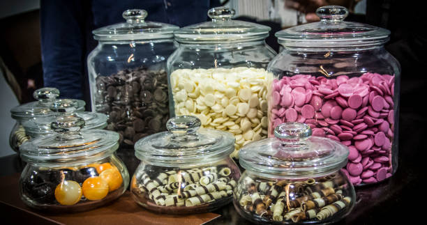 istock Colorful Candies in Glass Jars 958551152