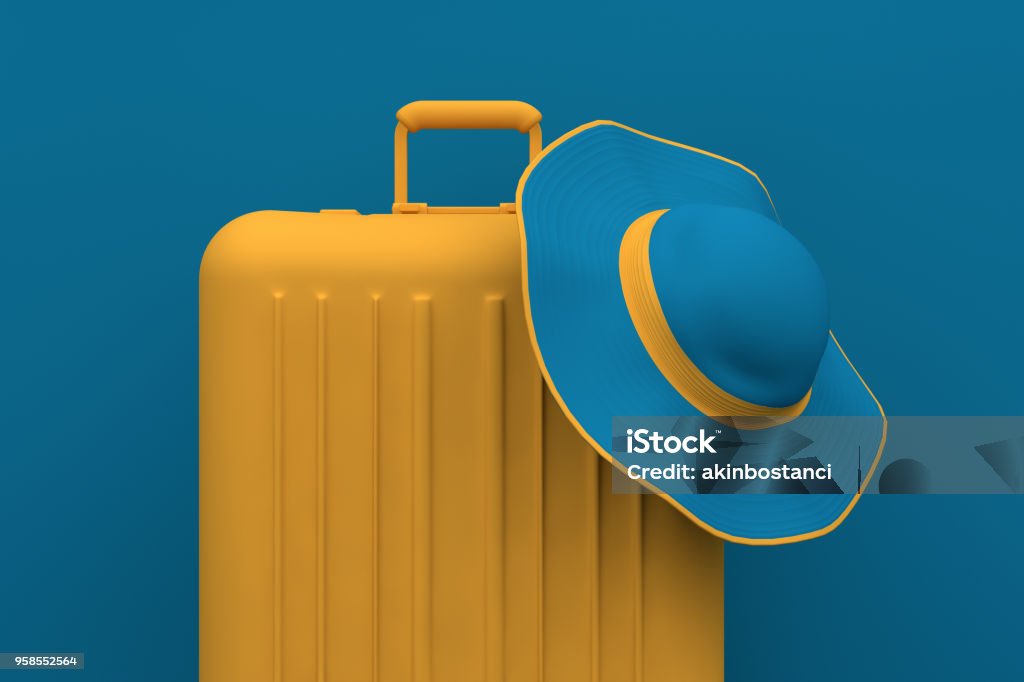 Sommer reisekonzept, Hut und Koffer auf blauem Hintergrund - Lizenzfrei Koffer Stock-Foto