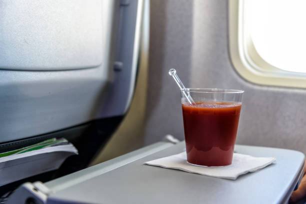 istock tomato juice in an airplane 958555492