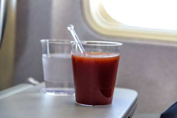 istock tomato juice in an airplane 958556216