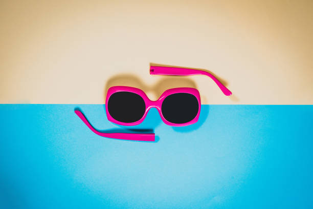 istock Studio shot of pink sunglasses. 958558656