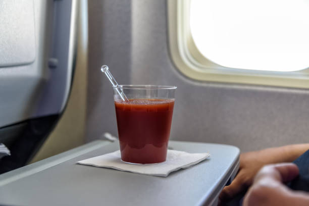 istock tomato juice in an airplane 958558946