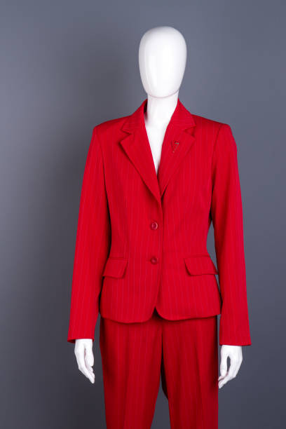 istock Mannequin in red female formal style suit. 958559372