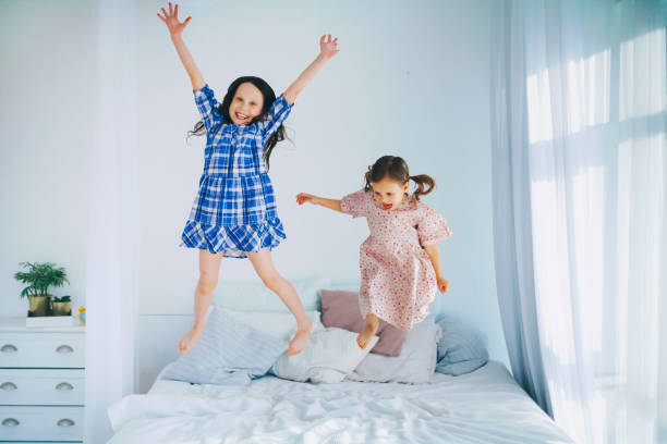 istock The children are jumping. 958562278