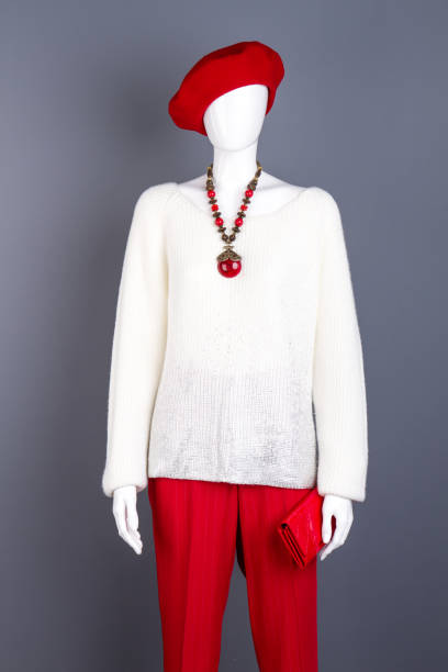 istock Female mannequin in white and red outfit. 958562660
