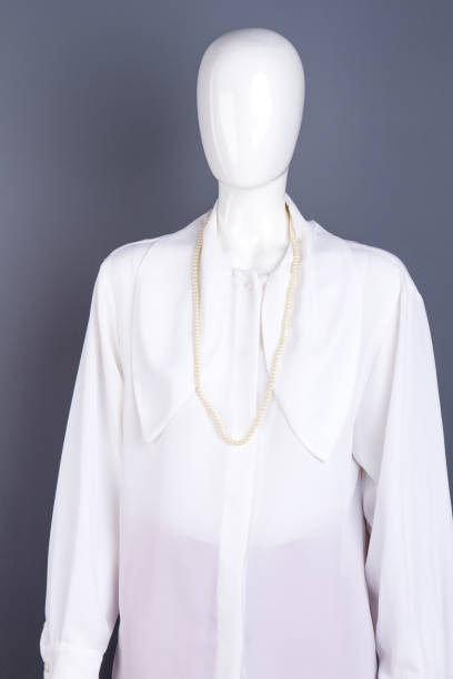 istock Women white chiffon blouse on mannequin. 958562740