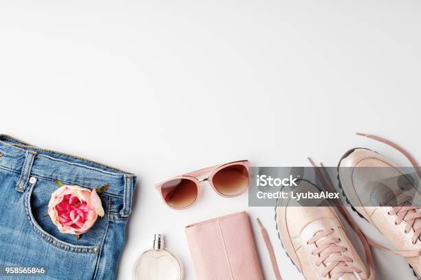 Flat Lay Pink Feminine Clothes And Accessories On White Background Stock Photo - Download Image Now