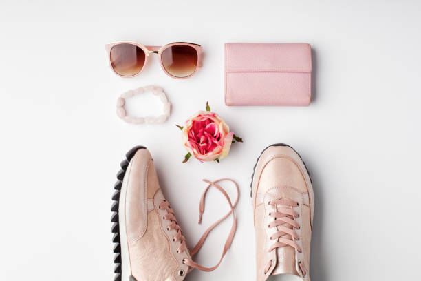 istock Flat lay pink feminine accessories on white background. 958565916