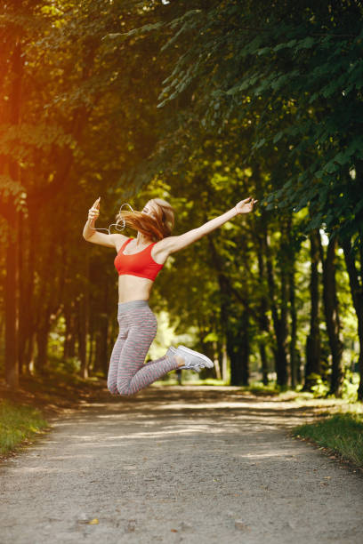 istock girl working out by herself 958566034