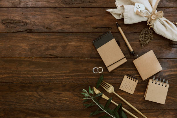 Flat lay wedding concept. Wedding planner items on wooden background