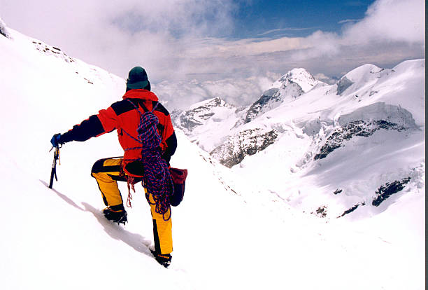 Mountaineering in the french alps stock photo